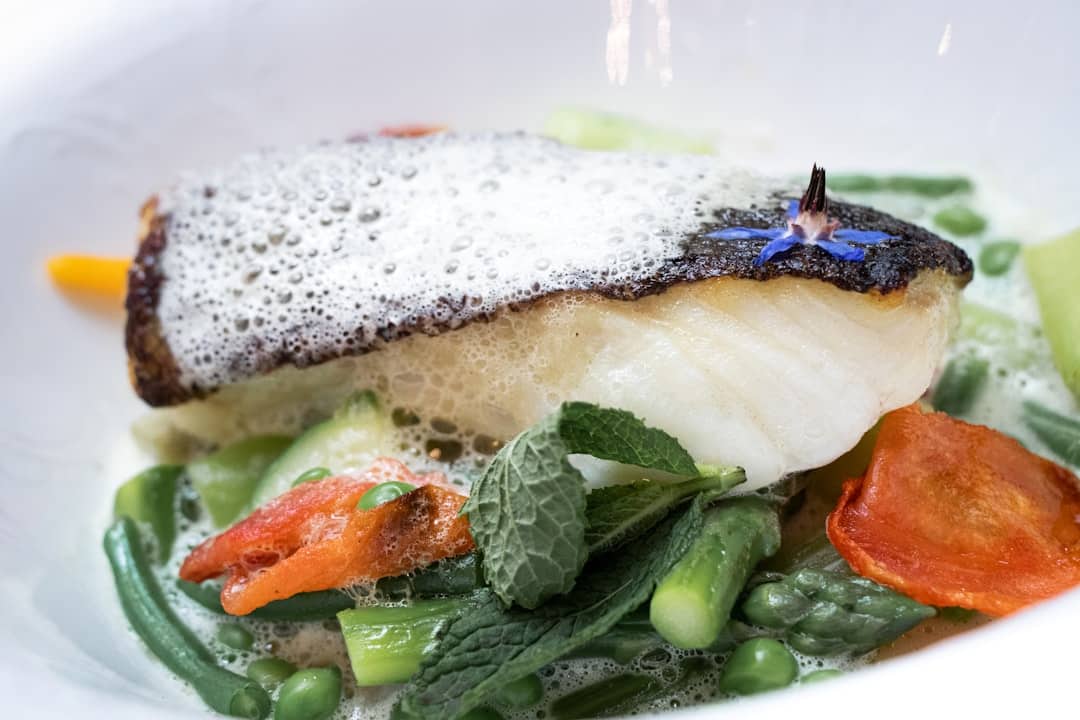 tray-baked cod with runner beans, pancetta and pine nuts